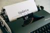 Pic of word update on typewriter